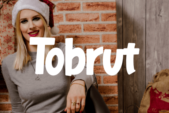 Tobrut: A Versatile Script Typeface for Editorial Design